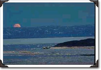 Moon rising, Frobisher Bay, N.W.T.