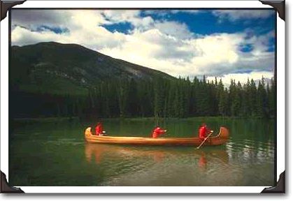 Canoeist on lake, Banff, Alberta