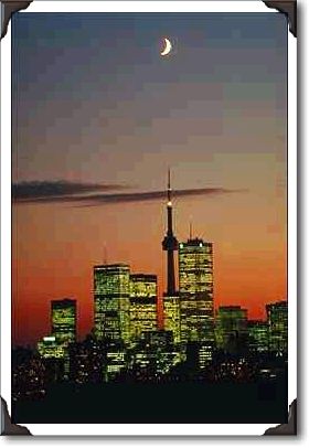 Skyline with CN Tower, rosy afterglow and crescent moon