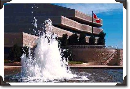 A cooling fountain in front of the Canadian Shield Wing