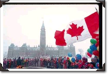 Crowd on Parliament Hill with a flag, Ottawa
