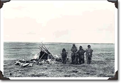 Inuit family, N.W.T.; photo G.M. Douglas pa-150896
