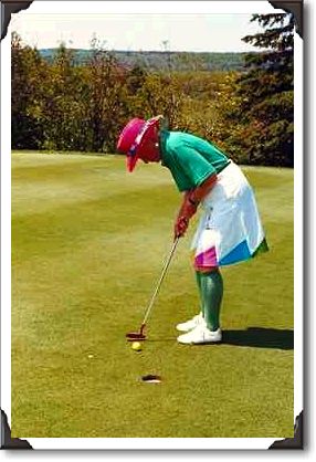 Senior citizen playing golf, Nova Scotia