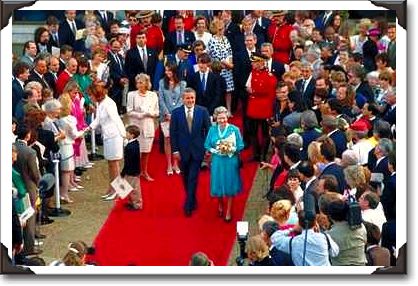Queen Elizabeth and Prime Minister coming out of museum, Hull